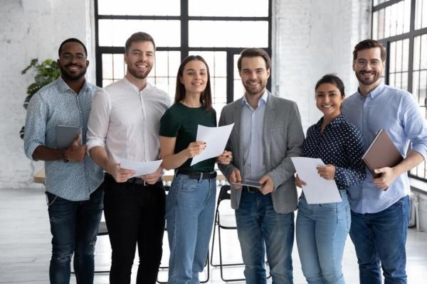 diverse group of young people in an office