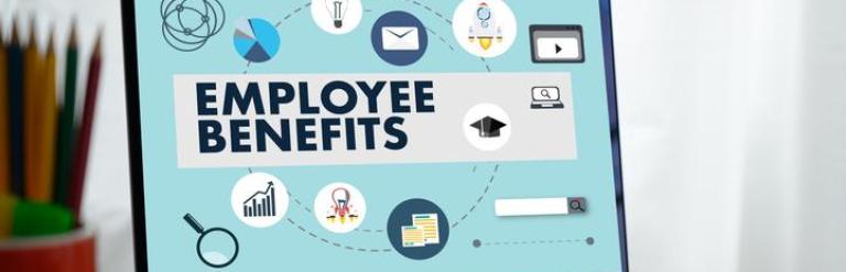 Laptop with employee benefits webpage open